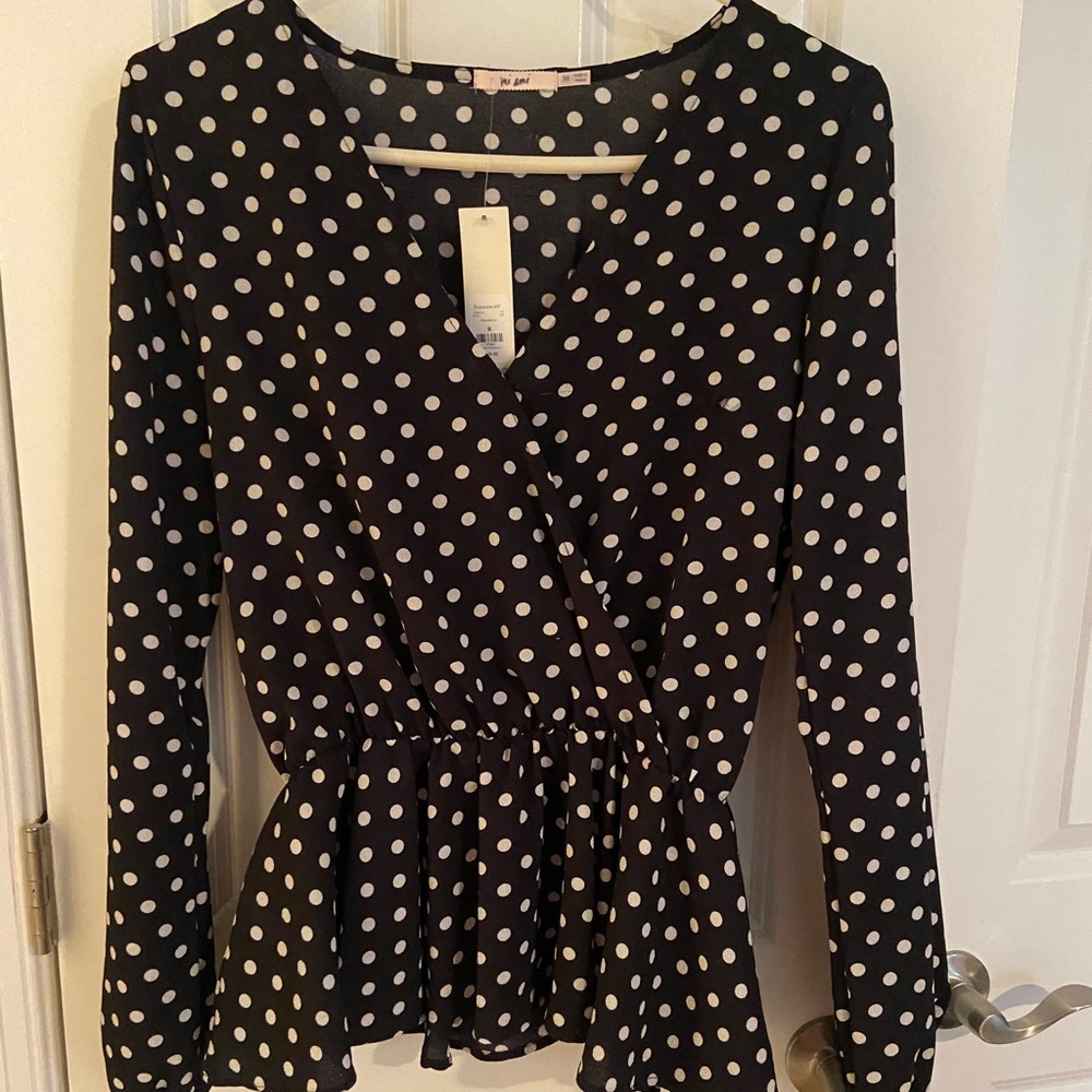 NWT. Polka Dot Peplum Blouse. Francesca’s. Size M